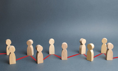 Chain of people figurines connected by red lines. Cooperation and interaction between people and...