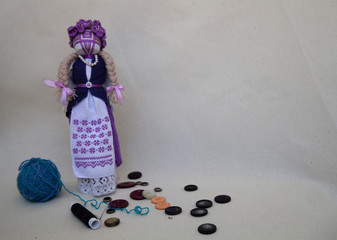 handmade purple motanka doll with embroidery
