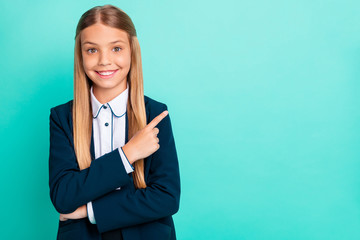 Close up photo beautiful she her little lady pretty hairdo like love study school hand arm index finger empty space wear formalwear shirt blazer school form isolated bright teal turquoise background