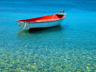 Fototapeta premium Red and White Boat in Sea