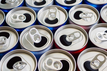 Empty aluminium drink cans recycling background concept