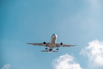 Travel by plane, aviation concept. Airliner in blue sky