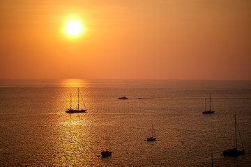 Sunset about sea with boat Thailand Phuket