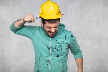 construction worker with a nail in his head, accident during work