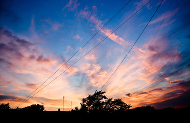 Sunset on the sky, colorful clouds and blue sky.