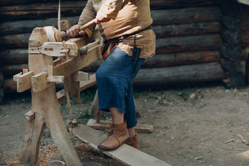 Milling operator turner working on vintage milling machine lathe