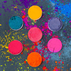 Colorful background with Indian Holi festive colors. Flat lay. Top view