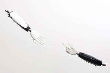 Outstretched robot hands on white background. Abstract robotic hands concept
