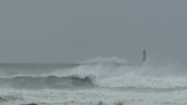 Large Waves Swamp The Entrance To A Port As A Major Hurricane Hits - Megi