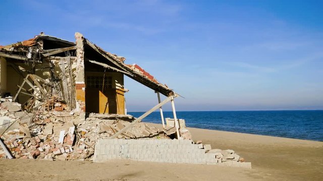 The ruins of an old abandoned house on the Mediterranean coast in Spain. 4K