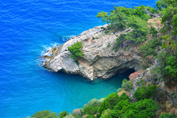 Grotto in the rock by the sea. Mediterranean Sea.