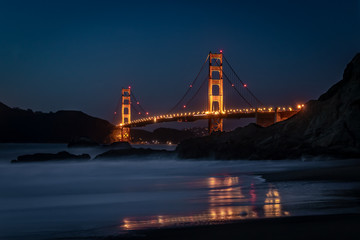 Golden Gate Bridge at night as seen from Baker Beach, San Francisco, California, United States of America