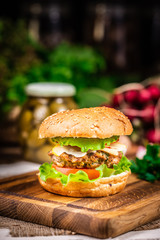 Burger with cheese and salad