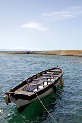 Obraz premium Small boat in the port of Chania, Crete