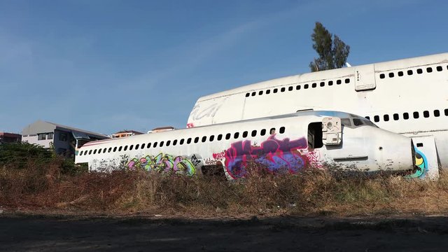 Time Lapse Abandoned Aircraft Graveyard, Locked Off Airliner Fuselage In Field