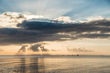 Sunrays behind clouds