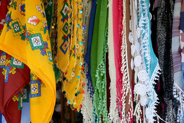 colorful scarves for sale at the market