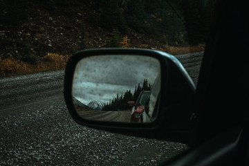 Rear mirror view on highway
