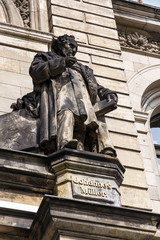 Obraz premium Johannes Peter Muller statue in front of the Museum fur Naturkunde - Natural History Museum in Berlin, Germany, sunny summer day