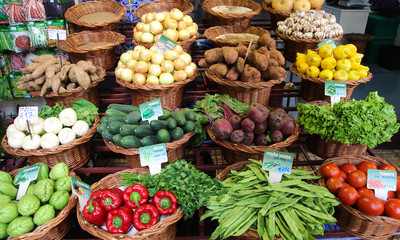 Various vegetables on Madeira marketplace in baskets