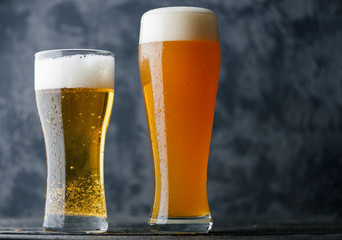 Two Beers on the table. Wheat unfiltered beer and lager