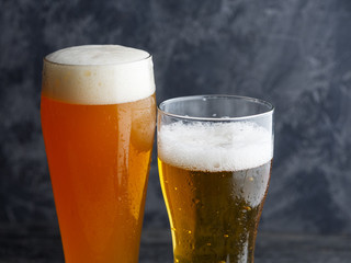 Two Beers on the table. Wheat unfiltered beer and lager