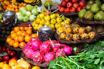 Various colorful tropical fruits in Madeira marketplace