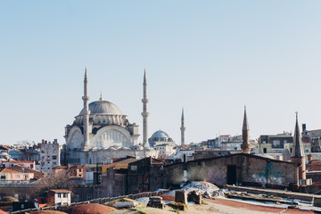 Fototapeta na wymiar The roof of the Grand Bazaar, Suleymaniye Mosque in Istanbul, Turkey. View of the mosque with minarets. Istanbul panorama