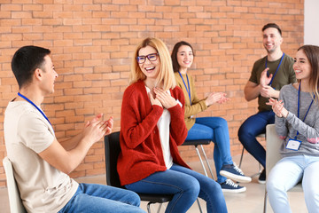 People at group therapy session