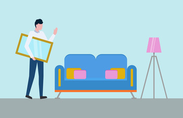 Man with mirror or picture frame in hands in room with sofa and lamp on tripod. Vector couch with pillows and cartoon person, interior design with furniture