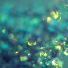 Fototapeta na wymiar Abstract background of glitter and foil hologram.