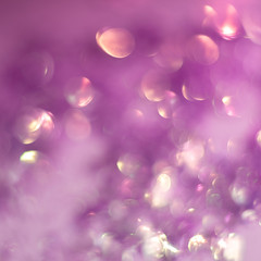 Abstract background of glitter and foil hologram.