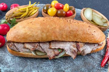 Traditional Turkish cuisine: Special bread meat doner kebab on background wooden. (doner meat on...