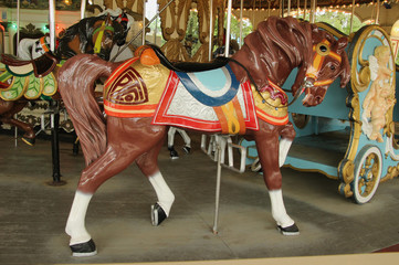 Fototapeta na wymiar Brown Carousel Horse with Head Down