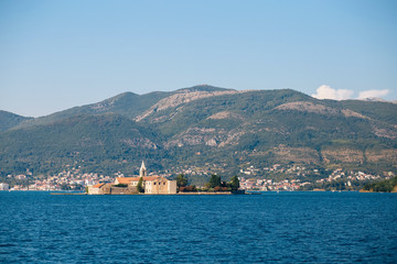 Adriatic Sea, Montenegro. View of a small church on the island of St. George in the Bay of Kotor,...