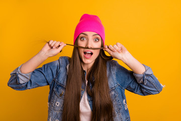 Close up photo beautiful amazing she her stylish lady friendly teen make false fake moustache like he him his man male guy wear specs casual jeans denim jacket pink hat isolated yellow background