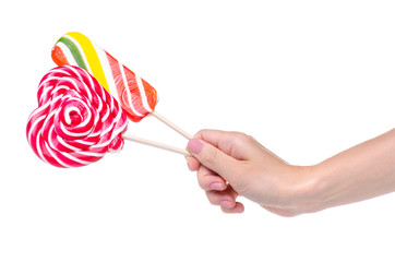 Candy lollipop colorful in hand on white background isolation