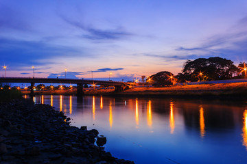 Beautiful long concrete bridge at sunset twilight