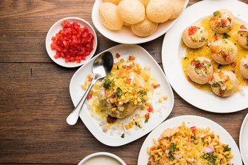 group of Bombay chat food includes golgappa/panipuri, bhel-puri, sev-poori, dahipuri, Ragda pattice, raj kachori etc. selective focus