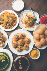 group of Bombay chat food includes golgappa/panipuri, bhel-puri, sev-poori, dahipuri, Ragda pattice, raj kachori etc. selective focus