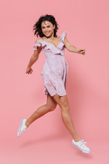 Full length of a smiling young girl wearing summer dress