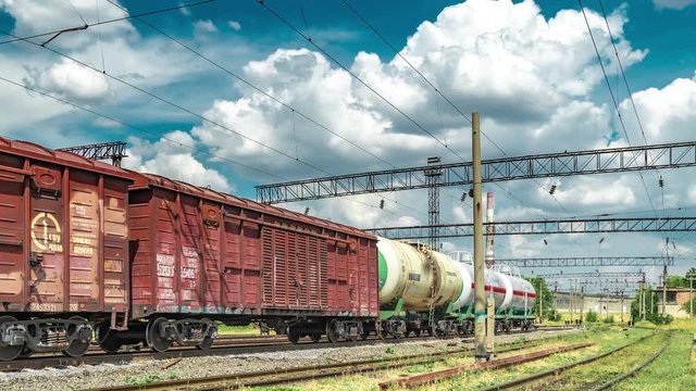 Freight railroad hopper train at the railway station. Timelapse 4K