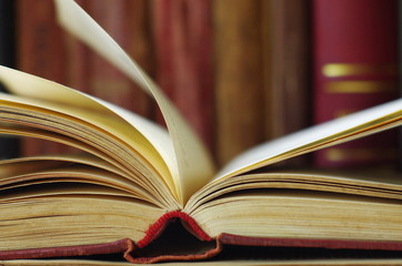 open old book on the background of the covers of old books