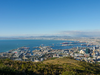 Amazing panoramic view of beautiful Cape Town from the slopes of Signal Hill showing v&a waterfront, harbour, business centre and, in the distance, the Cape Flats. Western Cape. South Africa