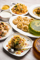 group of Bombay chat food includes golgappa/panipuri, bhel-puri, sev-poori, dahipuri, Ragda pattice, raj kachori etc. selective focus