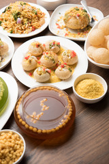 group of Bombay chat food includes golgappa/panipuri, bhel-puri, sev-poori, dahipuri, Ragda pattice, raj kachori etc. selective focus