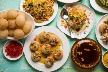 group of Bombay chat food includes golgappa/panipuri, bhel-puri, sev-poori, dahipuri, Ragda pattice, raj kachori etc. selective focus