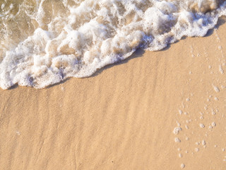 wave foam on the beach