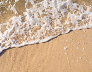 wave foam on the beach