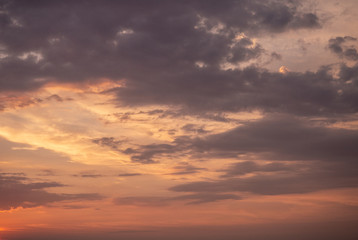 orange mystic sunset in the sky of Capri Italy at golden hour